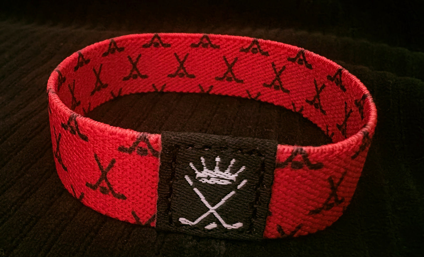 The Redline Crossed Sticks Wristband